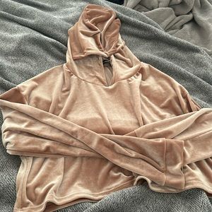 Cropped velvet top with hoodie.